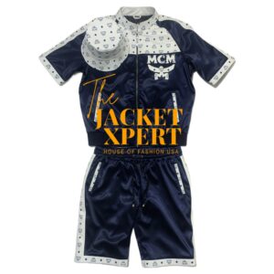 Dark blue and white MCM clothing set with gold branding by The Jacket Xpert.